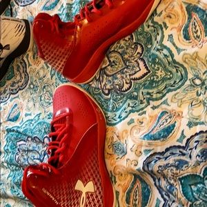 Red Under Armour basketball shoes